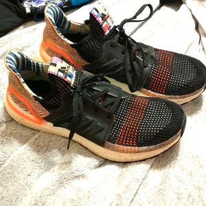 Men's size 9 and 1/2 boost sneakers by Adidas